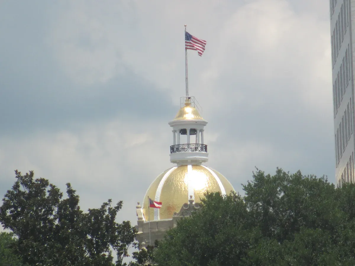 Gold dome of Savannah City Hall in the old city of Savannah, Georgia